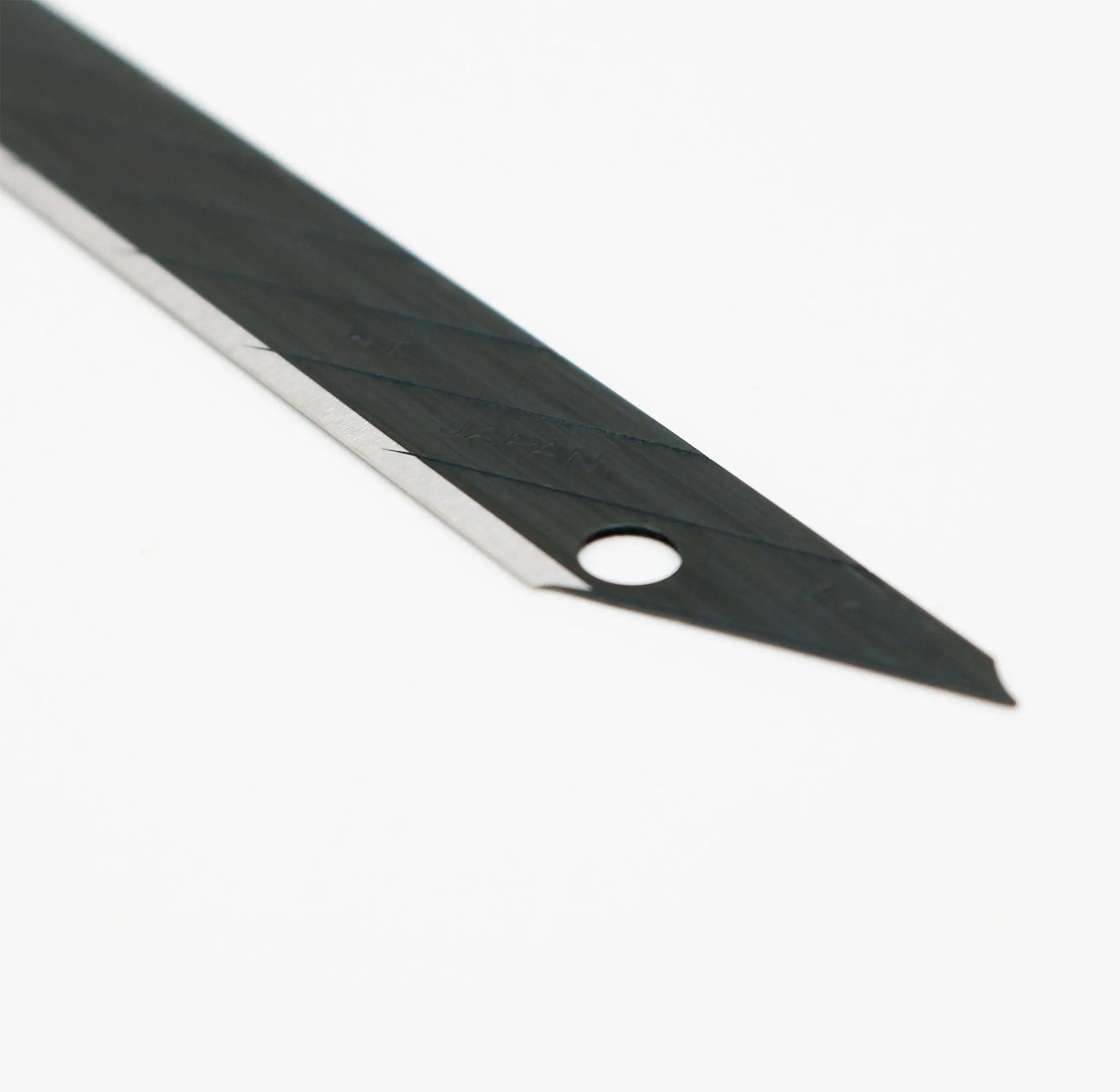 NT Cutter Extra Sharp Black 30° Blades - (10 or 100 Pack) - product in use