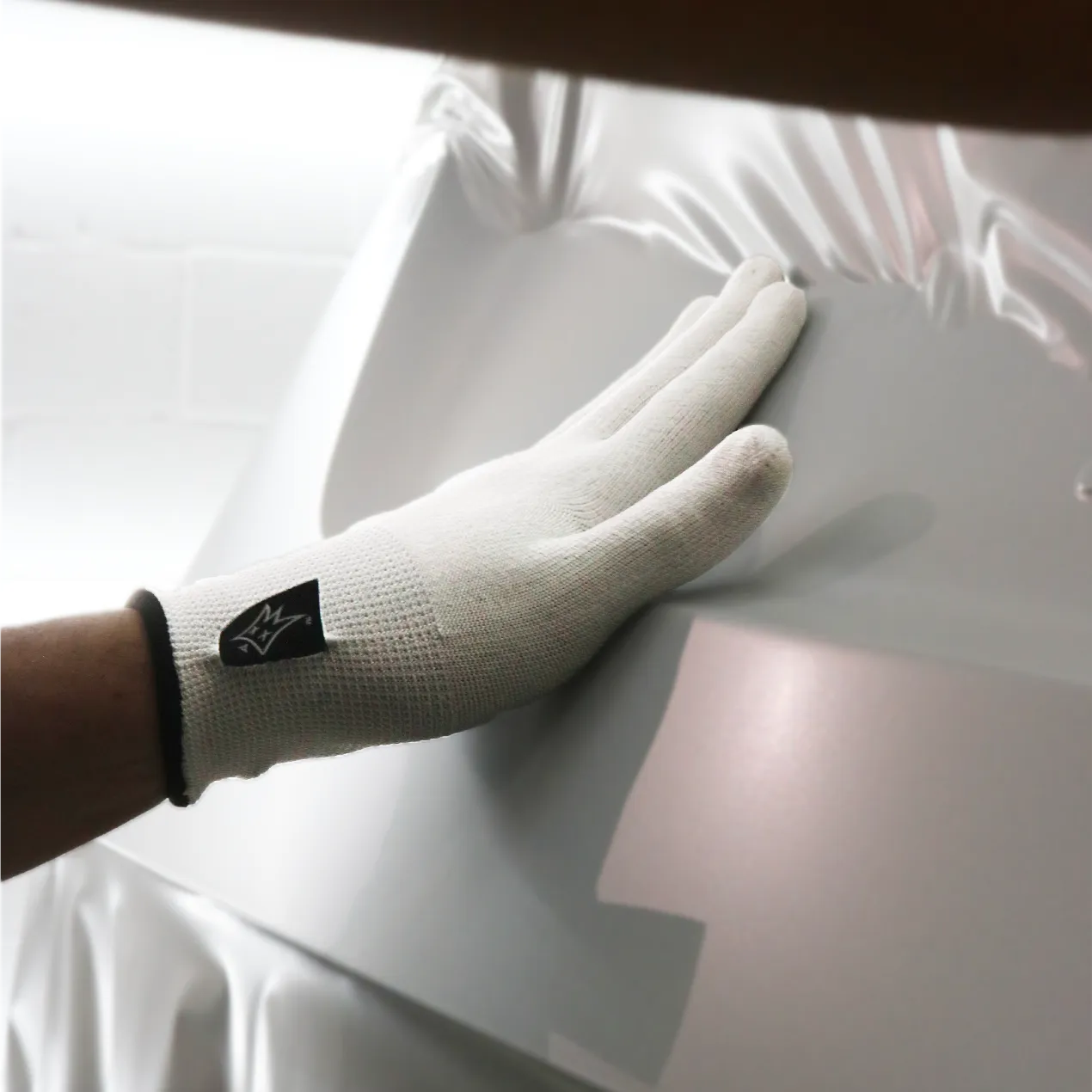 Off-Wrap Silk Touch  - Vinyl Wrap Gloves vinyl wrap glove - close-up detail view